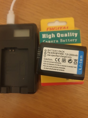 New fw50 battery charger - new,